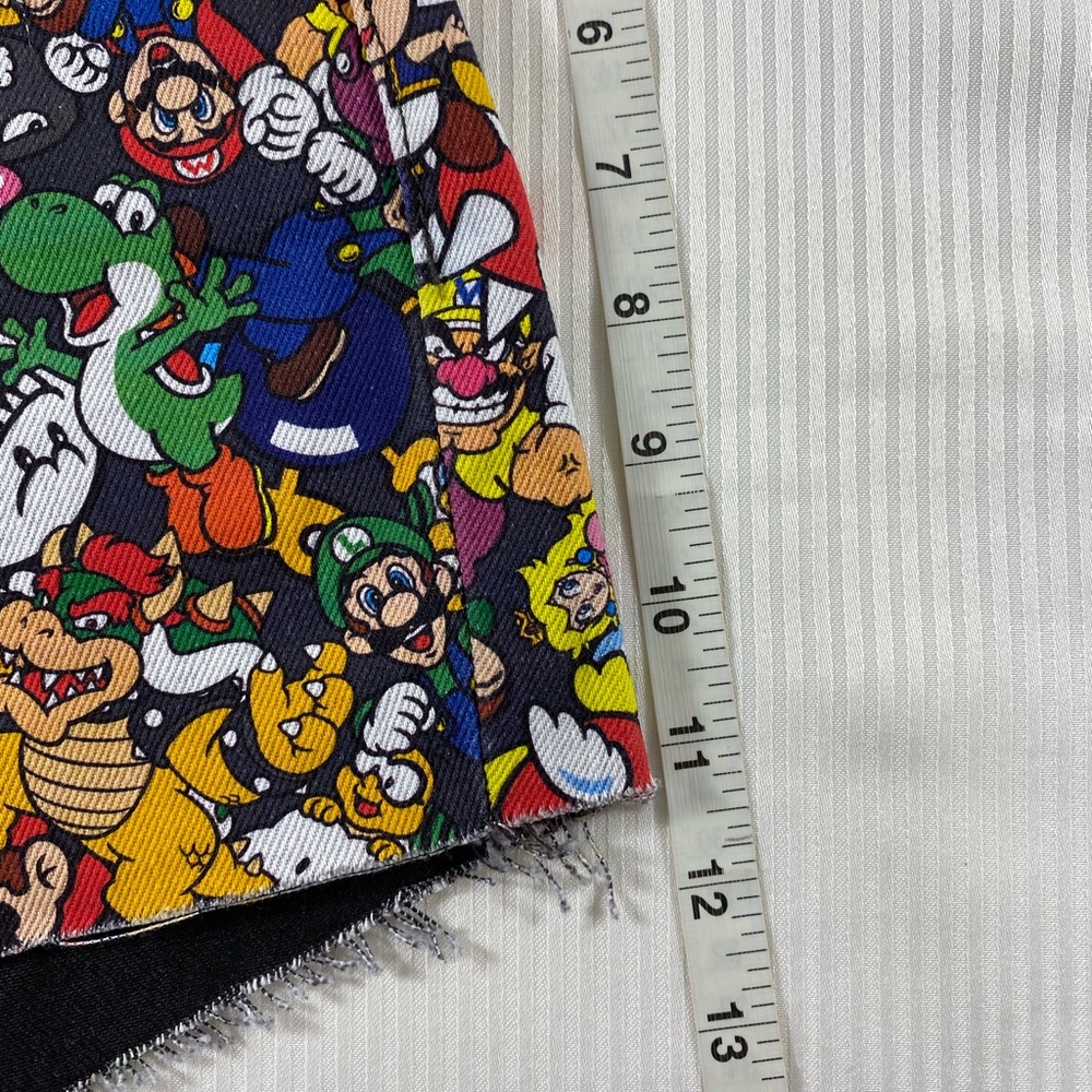 Levi’s x Super Mario 501 High Rise Jean Shorts - Picture 10 of 12